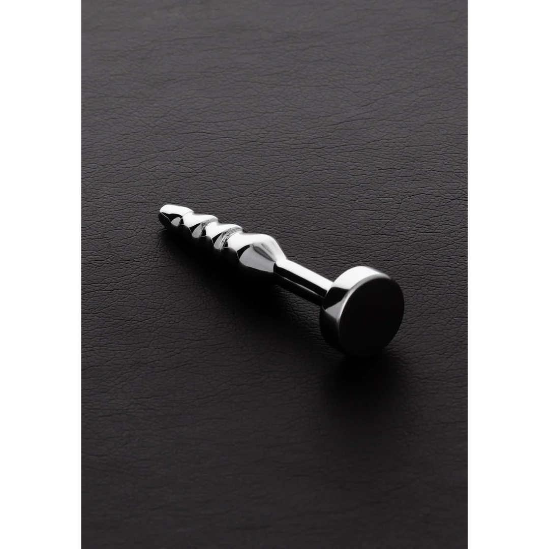 Tapón peneano con diseño escalonado estriado · Cockpin - Imagen 1